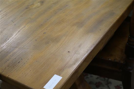 A Spanish style elm refectory table W.222cm